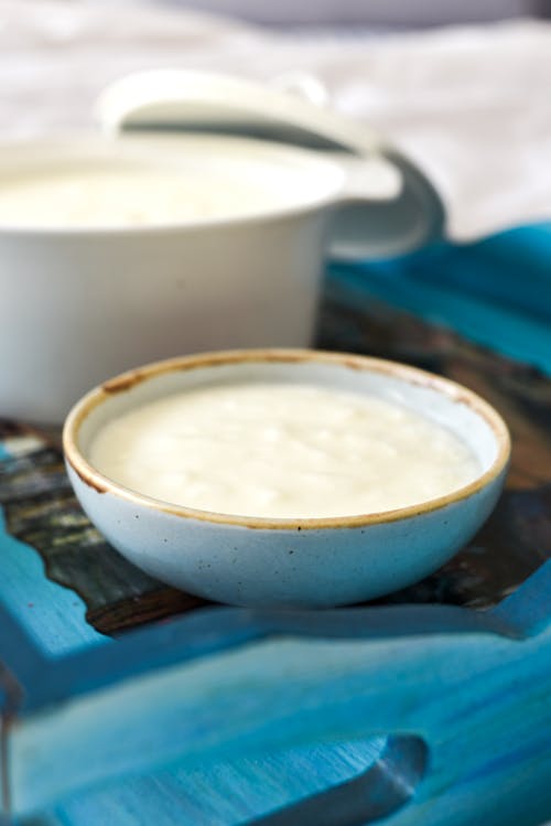 Free White Ceramic Bowl filled with Yogurt  Stock Photo