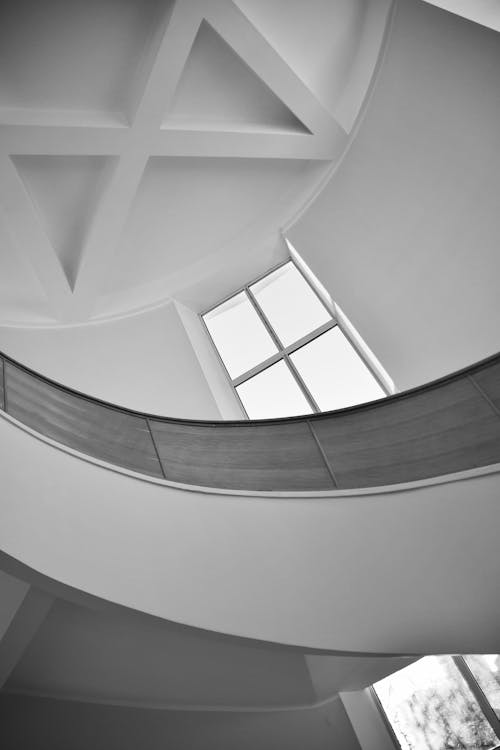 Monochrome Photo of a Spiral Staircase