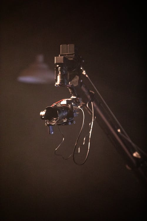 Black Camera Equipment supported by a Gimbal