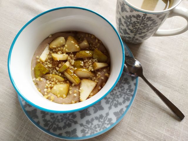 Delicious homemade breakfast bowl with pears and buckwheat in Czechia.