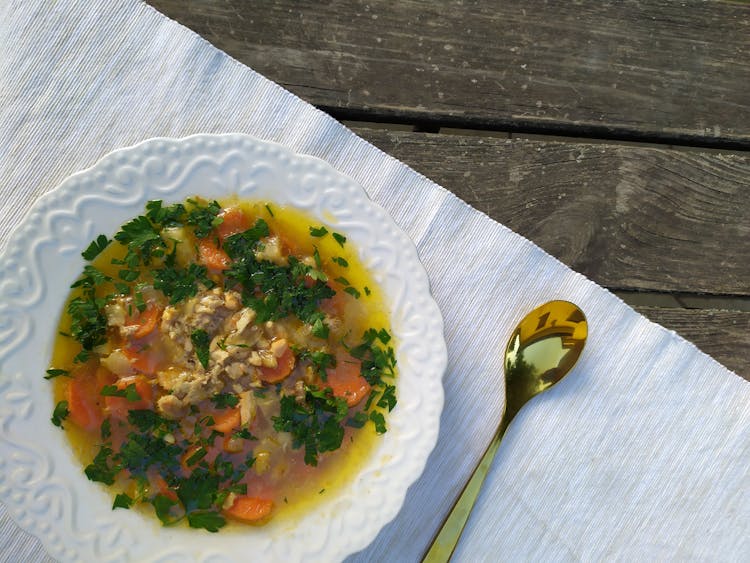 Chicken Soup In A White Plate 