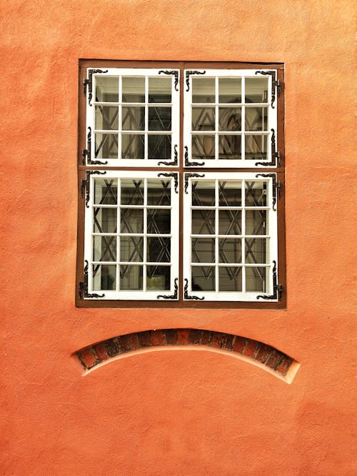 Glass Window on Orange Wall