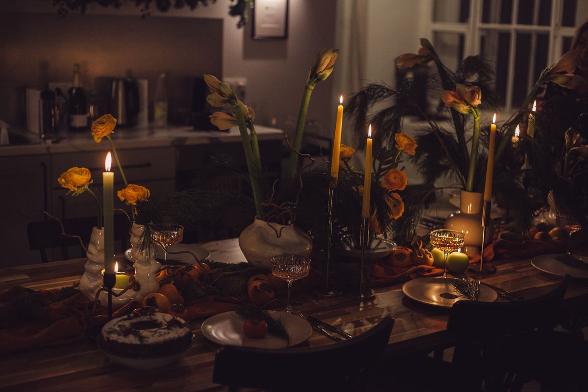 A candlelit table set for dinner