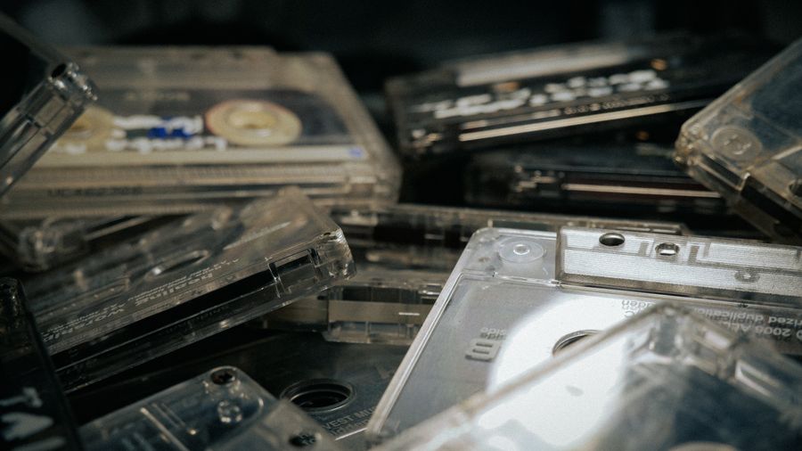 A pile of clear audio cassette tapes