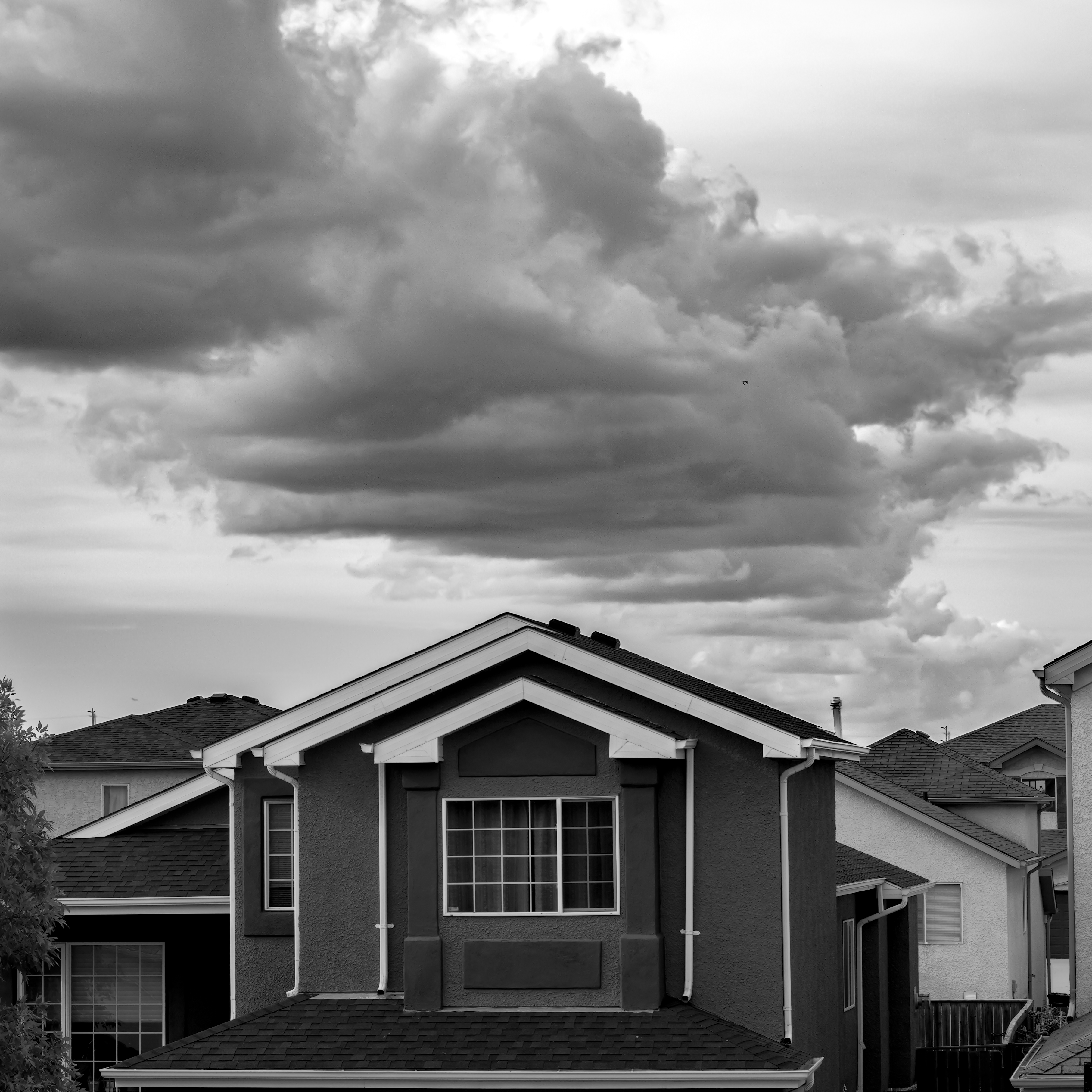 A residential neighborhood in Ohio illustrating the severe weather property value depreciation risks.