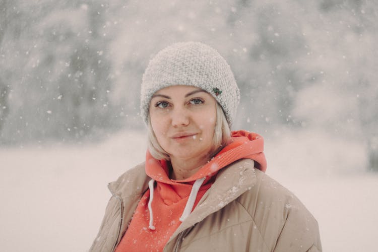 Portrait Of A Woman Standing In Snow