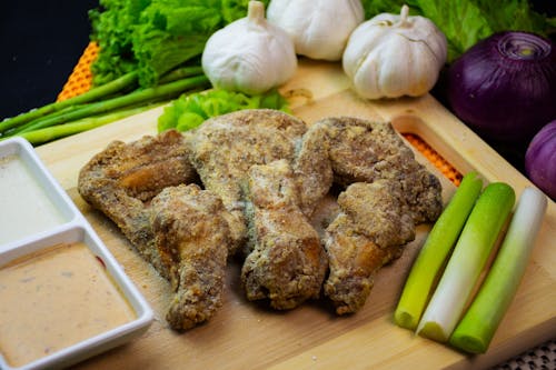 Chicken Wings on Wooden Chopping Board 