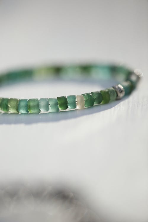 Free Green Beaded Bracelet in Close-Up Photography  Stock Photo