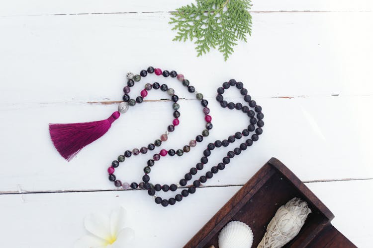 
A Close-Up Shot Of A Mala Bead Necklace