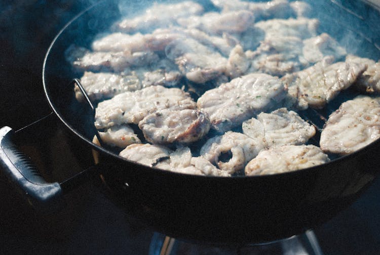 Meat Cooking On A Grill