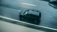 Motion-blurred SUV on a wet road - photo by Kaique Rocha on Pexels