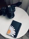 Black Canon Dslr Camera on White Table