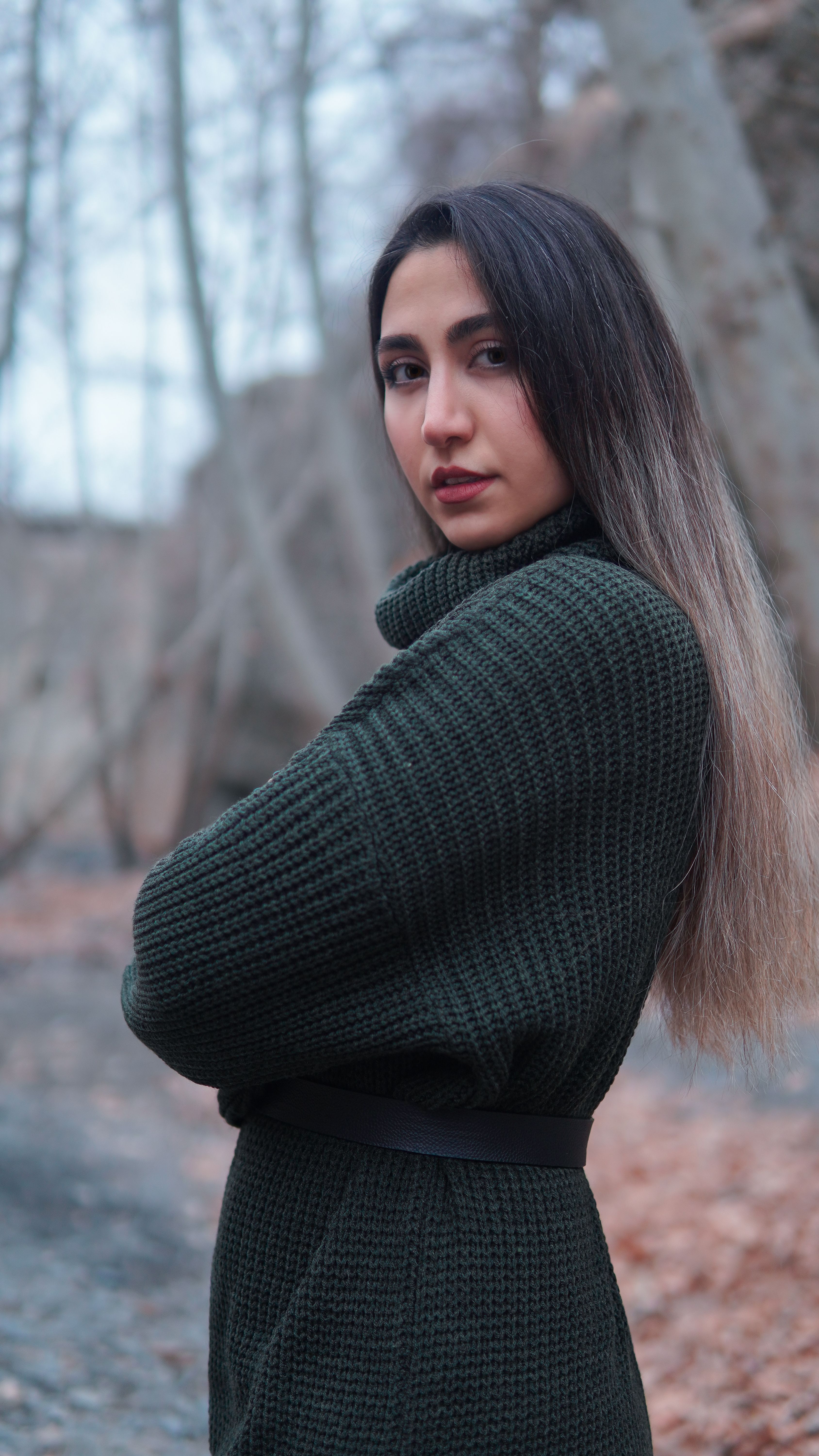 Back View of a Woman Black Sweater and Black Cap · Free Stock Photo