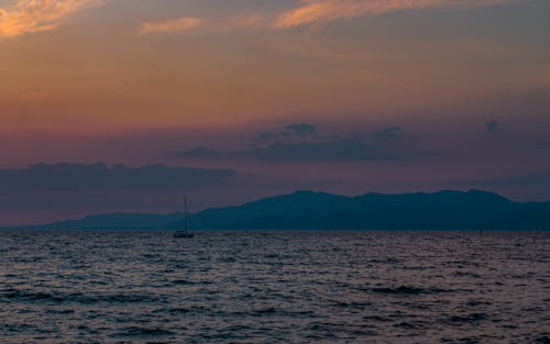 Free stock photo of boat, clouds, mountains