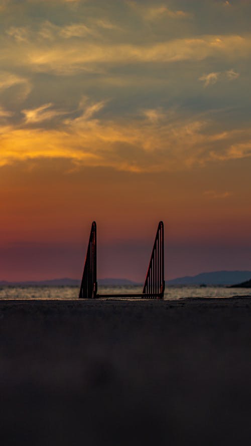 Free stock photo of ladder, mountains, sea