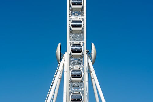 Free Low-Angle Shot of a White Ferris Wheel Stock Photo