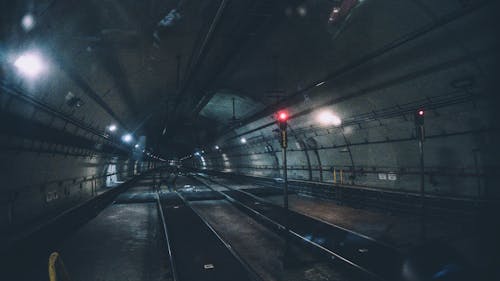 Architectural Photography of Gray Concrete Tunnel