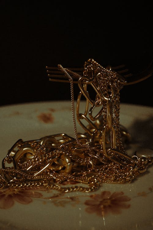 Gold Jewelries on the Plate
