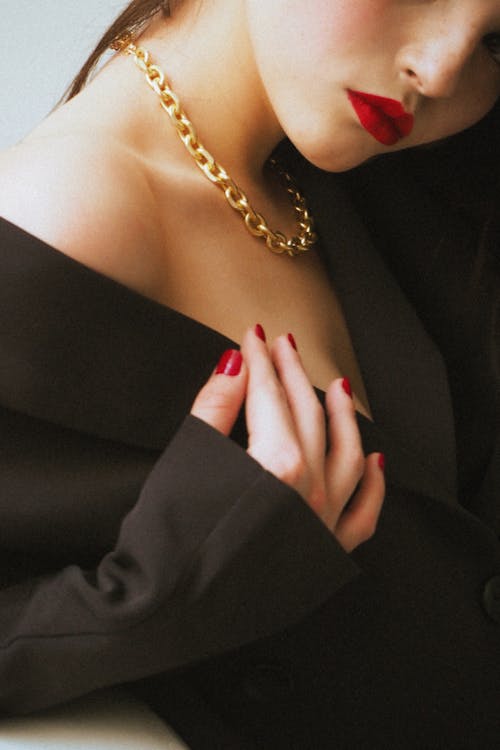 Free Woman Wearing Gold Necklace Stock Photo