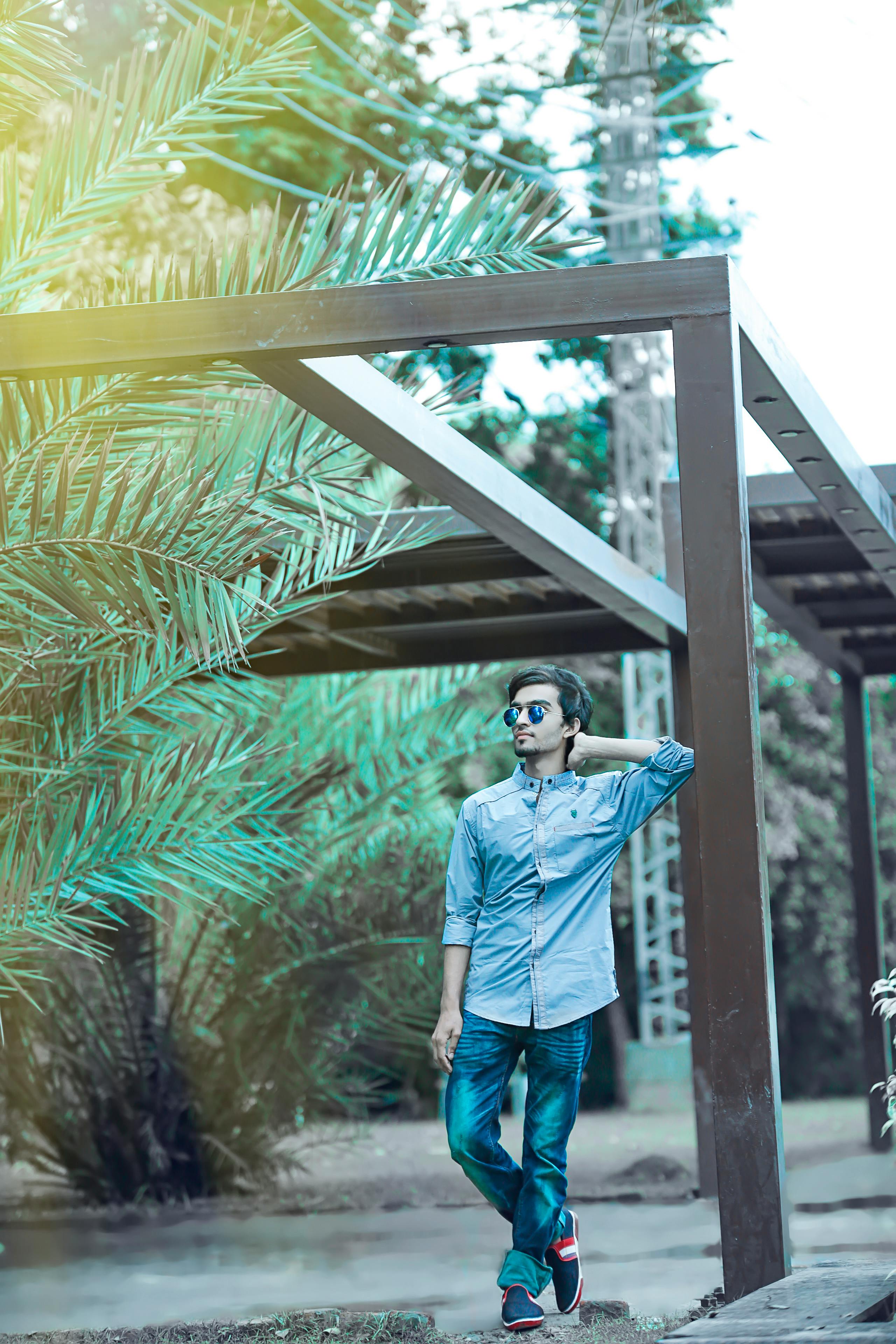 Stylishly Dressed Young Man Posing in a Park. Retro Style Photo Shoot.  Stock Photo - Image of fashionable, reads: 157354594