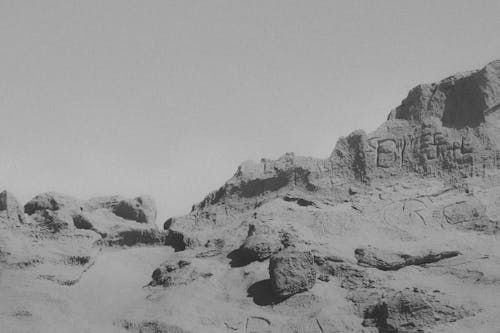 Grayscale Photo of a Rocky Mountain