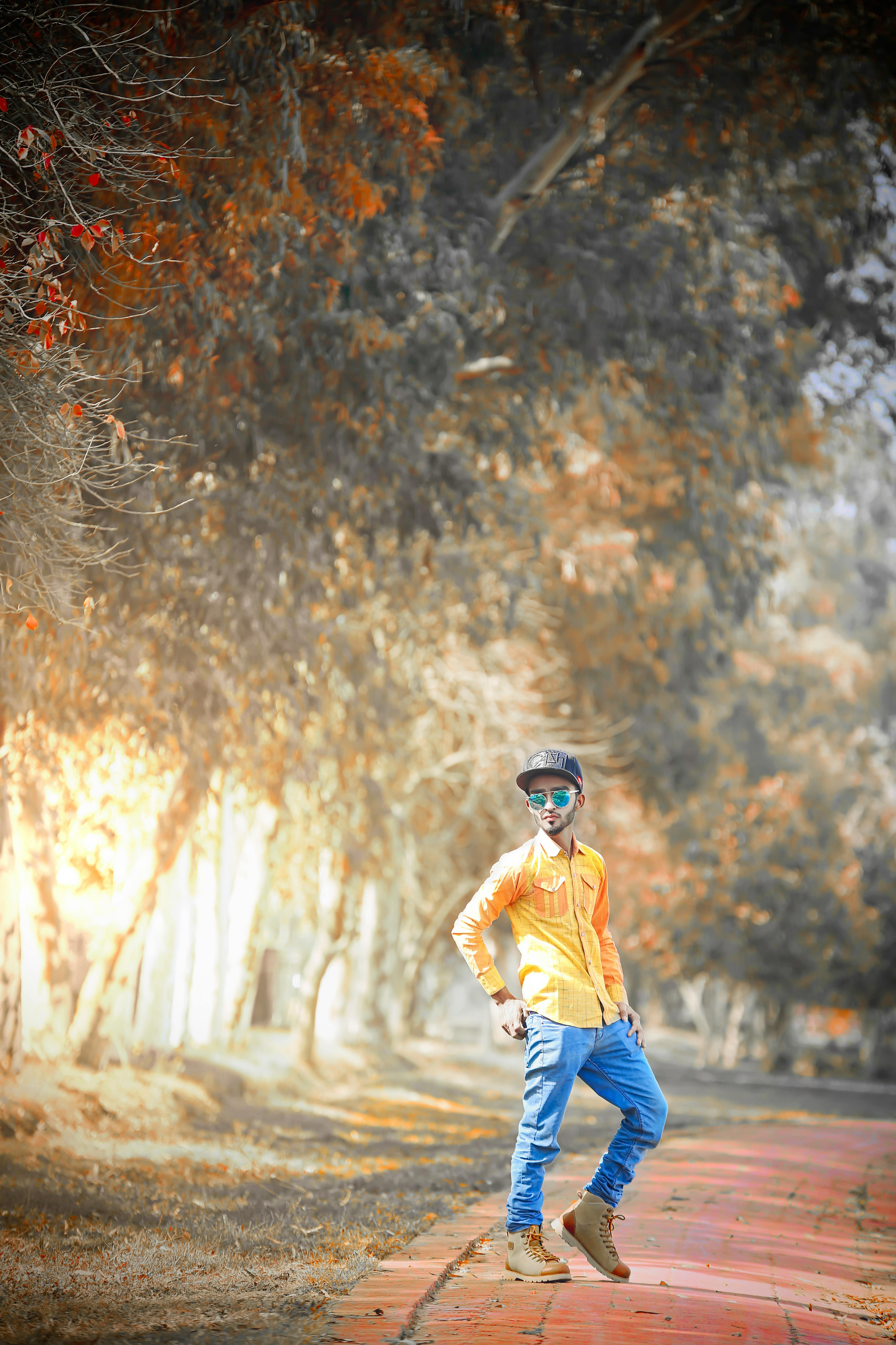 Men&rsquo;s Yellow Dress Shirt And Blue Denim Jeans · Free Stock Photo