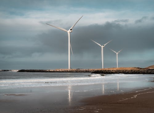 Wind Turbines Near Body of Water