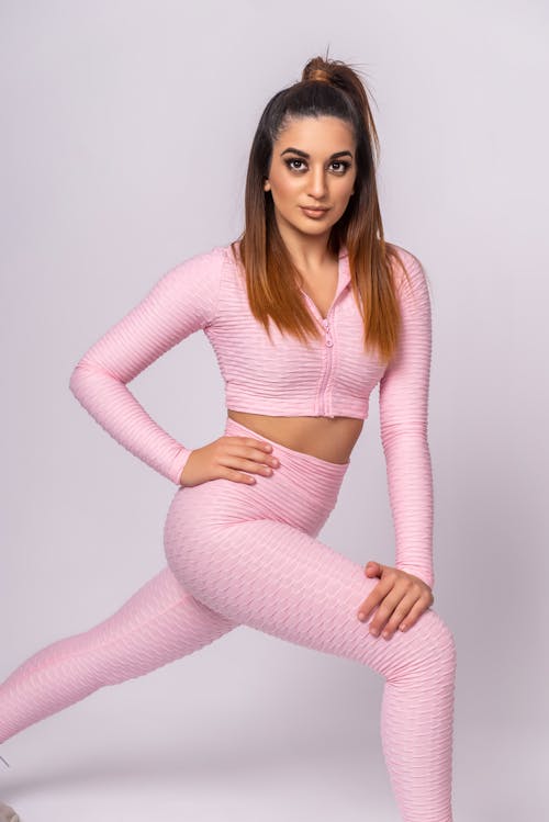 Woman in Pink Long Sleeve Shirt and Pink Pants