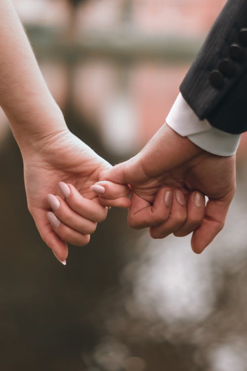 Close up of a Couple Holding Hands