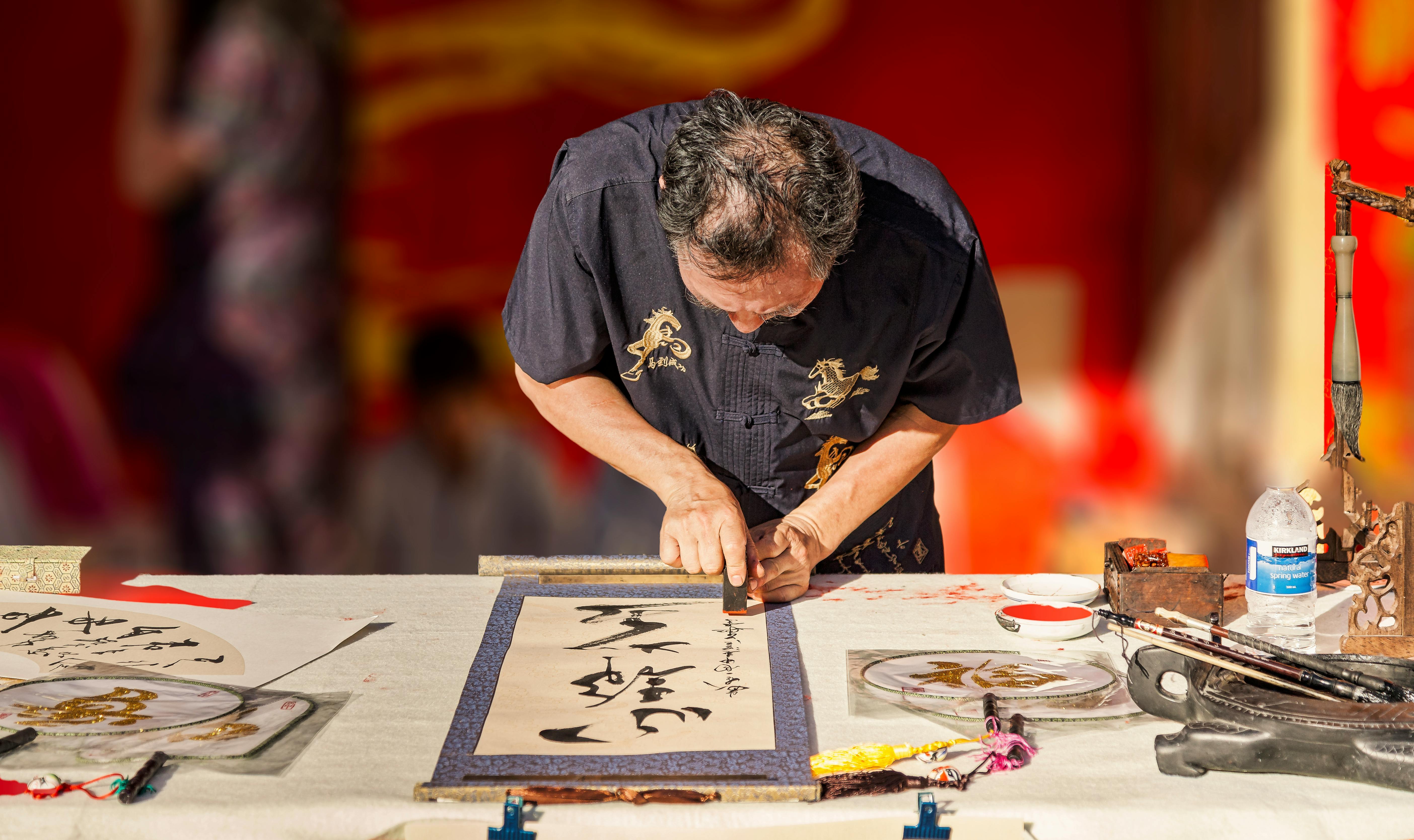 free-stock-photo-of-artistic-chinese-calligraphy-painter