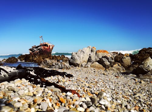 Free stock photo of beach, ocean, shipwreck Stock Photo