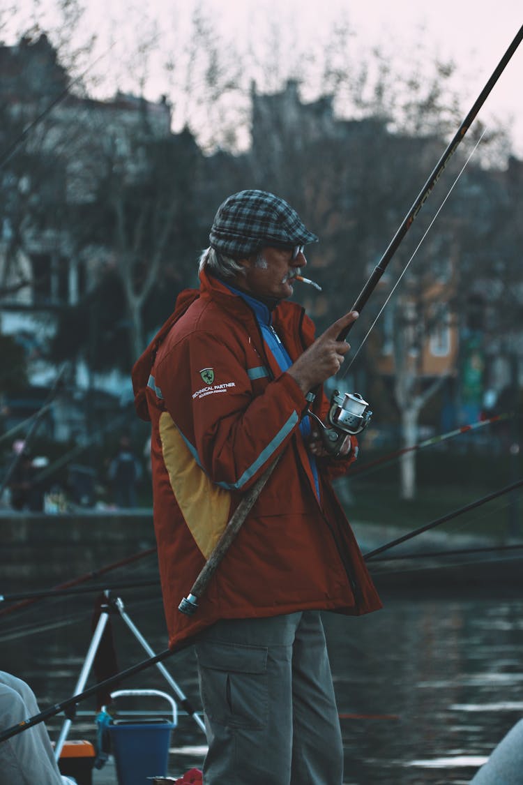 An Angler Fishing In The River 