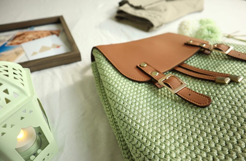 Handmade green crochet backpack with leather straps