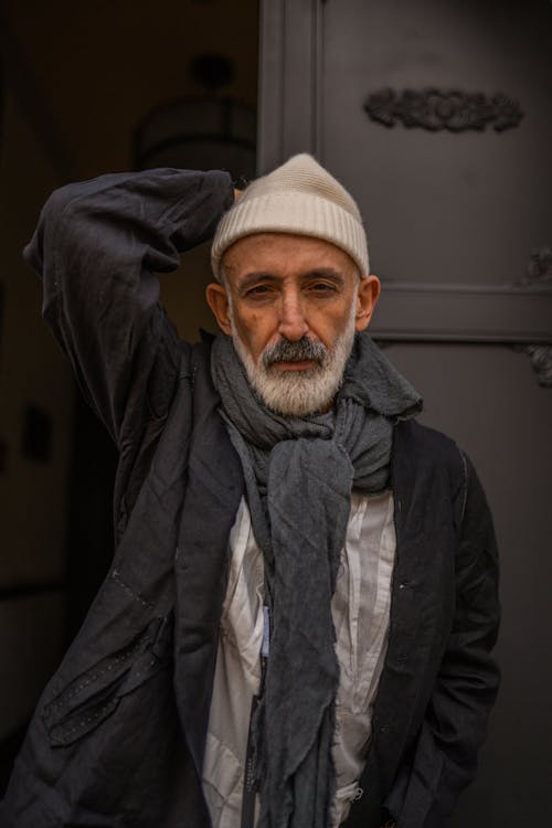 Man Standing in front of Doors