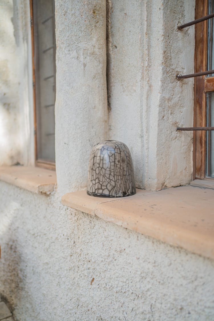 Vintage Cup On Windowsill