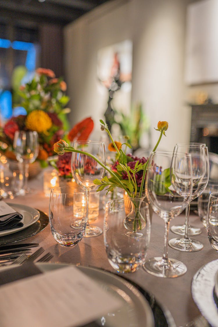 Flowers On A Table Set For Dinner 