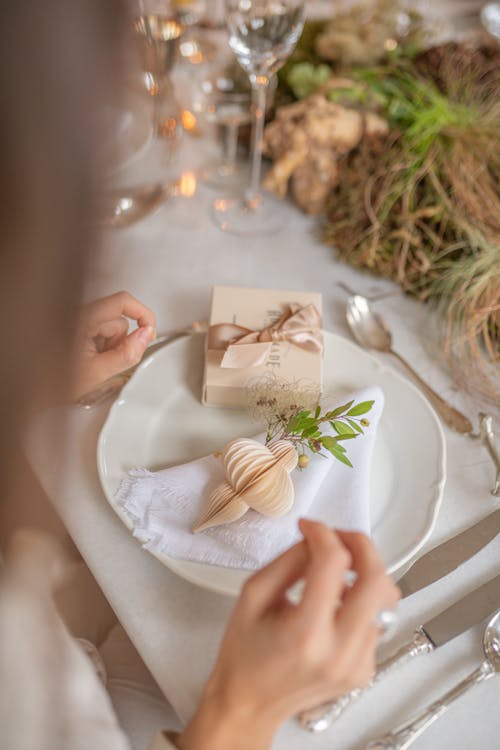 Free A Person Sitting at a Table Stock Photo