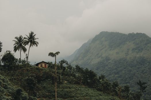 House on Hilltop in Mountains