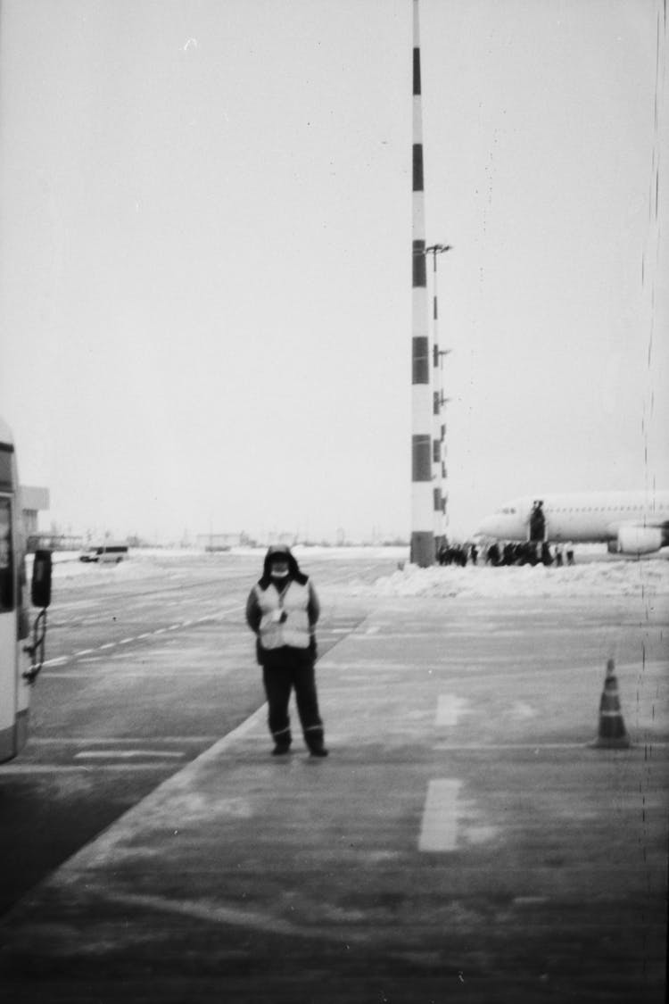 Man Standing On Airport