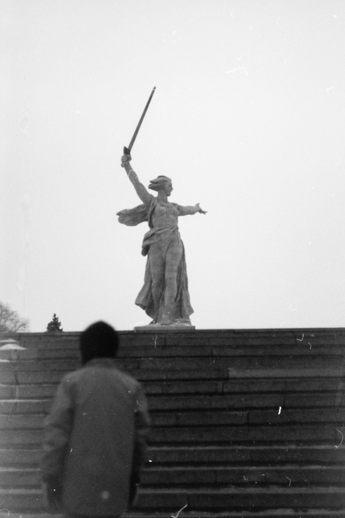 Free Black and white photo of a famous warrior sculpture with a raised sword. Stock Photo