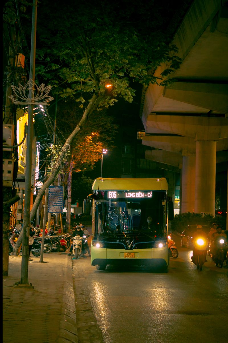 VinFast electric bus on a Hanoi street at night