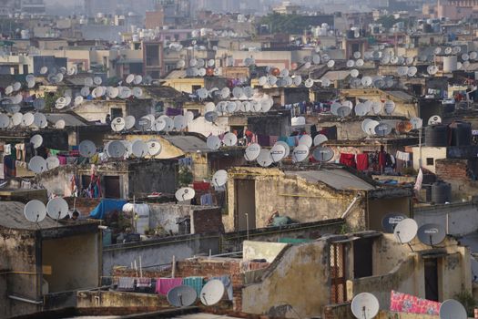 Poor Building Rooftops with Satellite Antennas