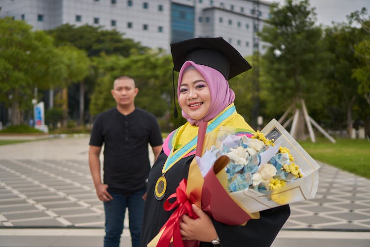 Woman In Graduation Gown