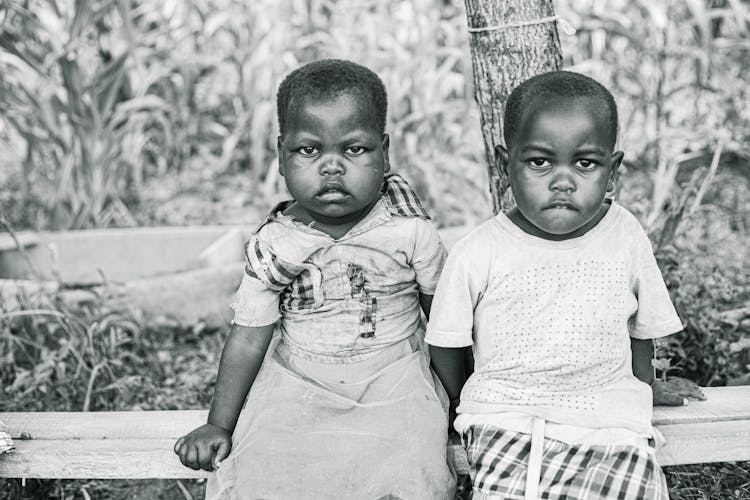 Black And White Portrait Of Two Babies 