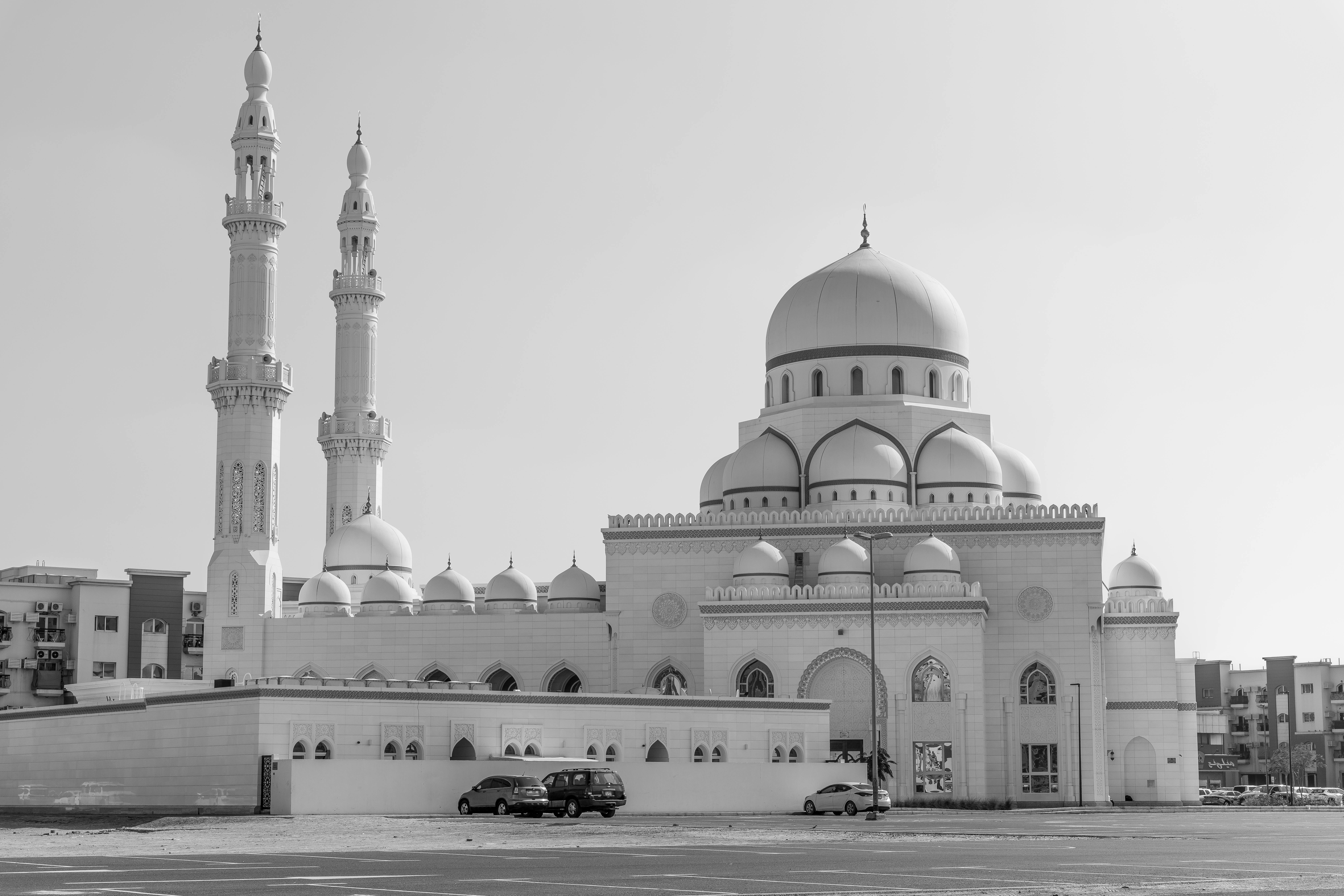 a grayscale photo of al noor mosque