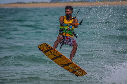 Dynamic kiteboarding scene capturing thrilling action in Kalpitiya, Sri Lanka.