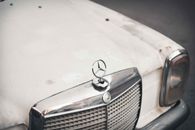 Close Up Photo of a White Vintage Car