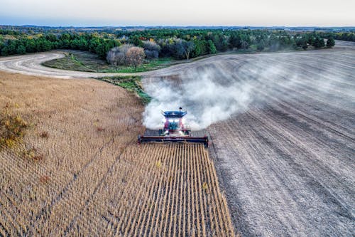 Free Drone Shot of a Combine Harvester Stock Photo