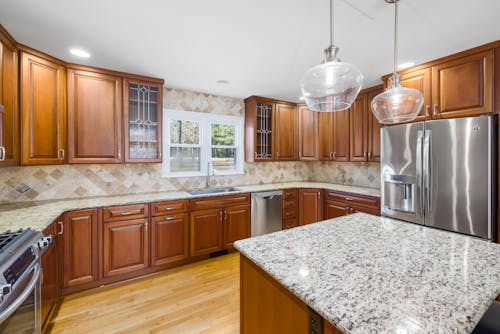 Spacious Kitchen with Wooden Cabinets