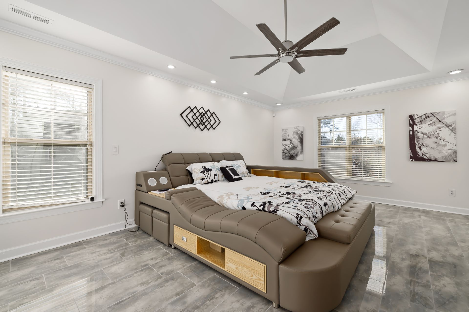 Elegant modern bedroom featuring a multifunctional luxurious bed with contemporary design.